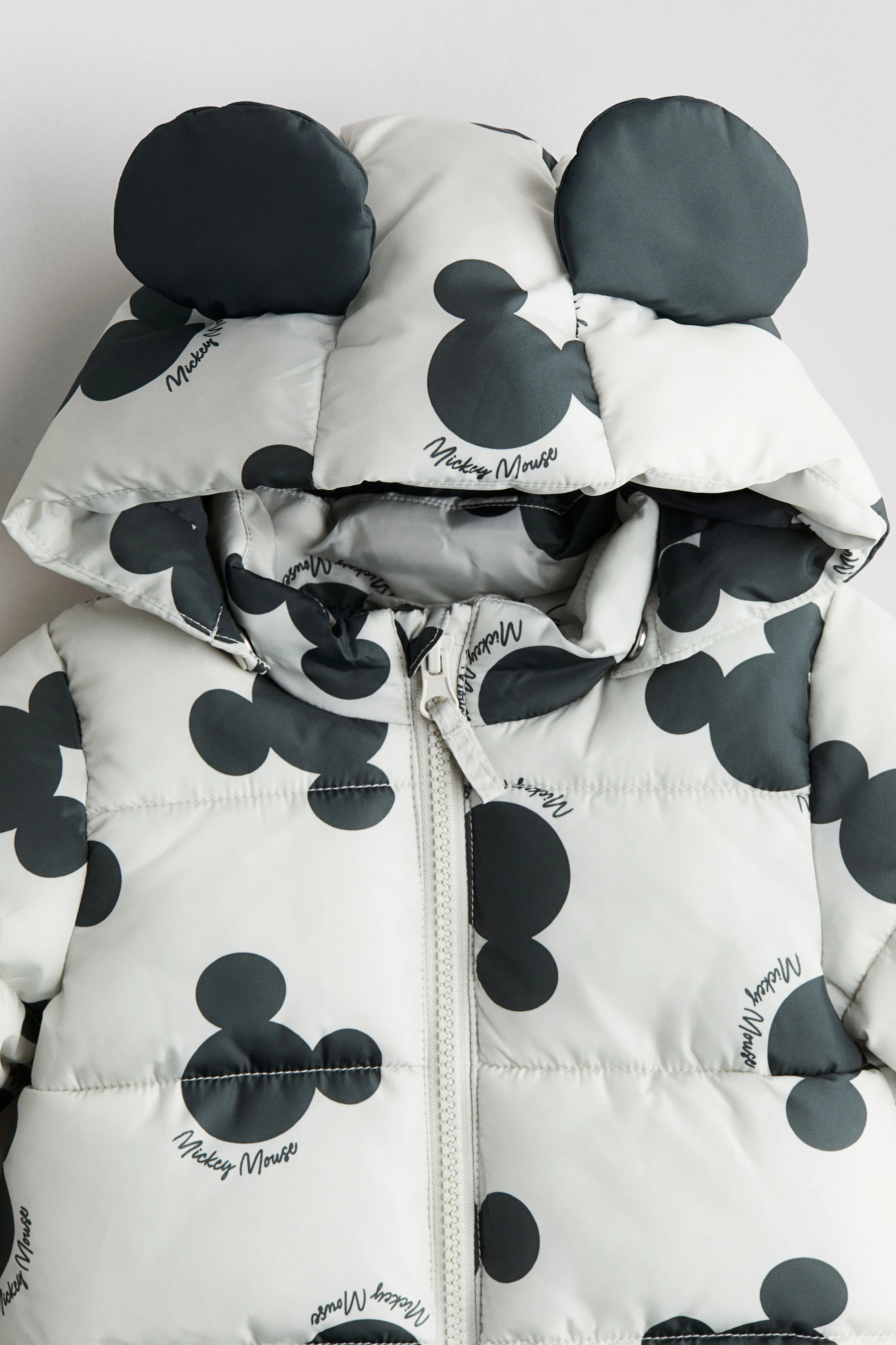 Appliquéd puffer jacket - Long sleeve - Regular length - Light grey/Mickey Mouse - Kids | H&M GB