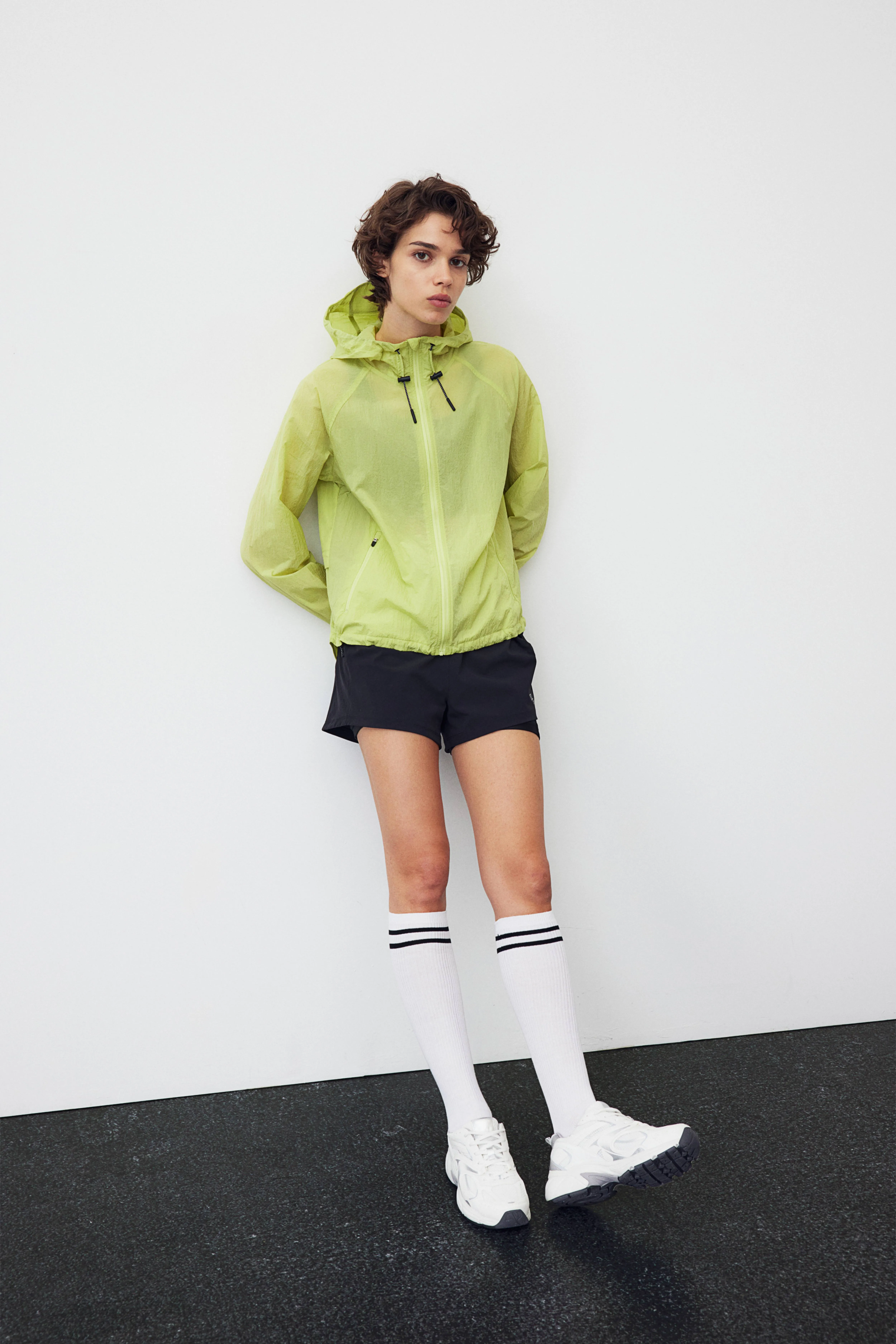 Hooded running jacket - Long sleeve - Regular length - Neon green - Ladies | H&M GB