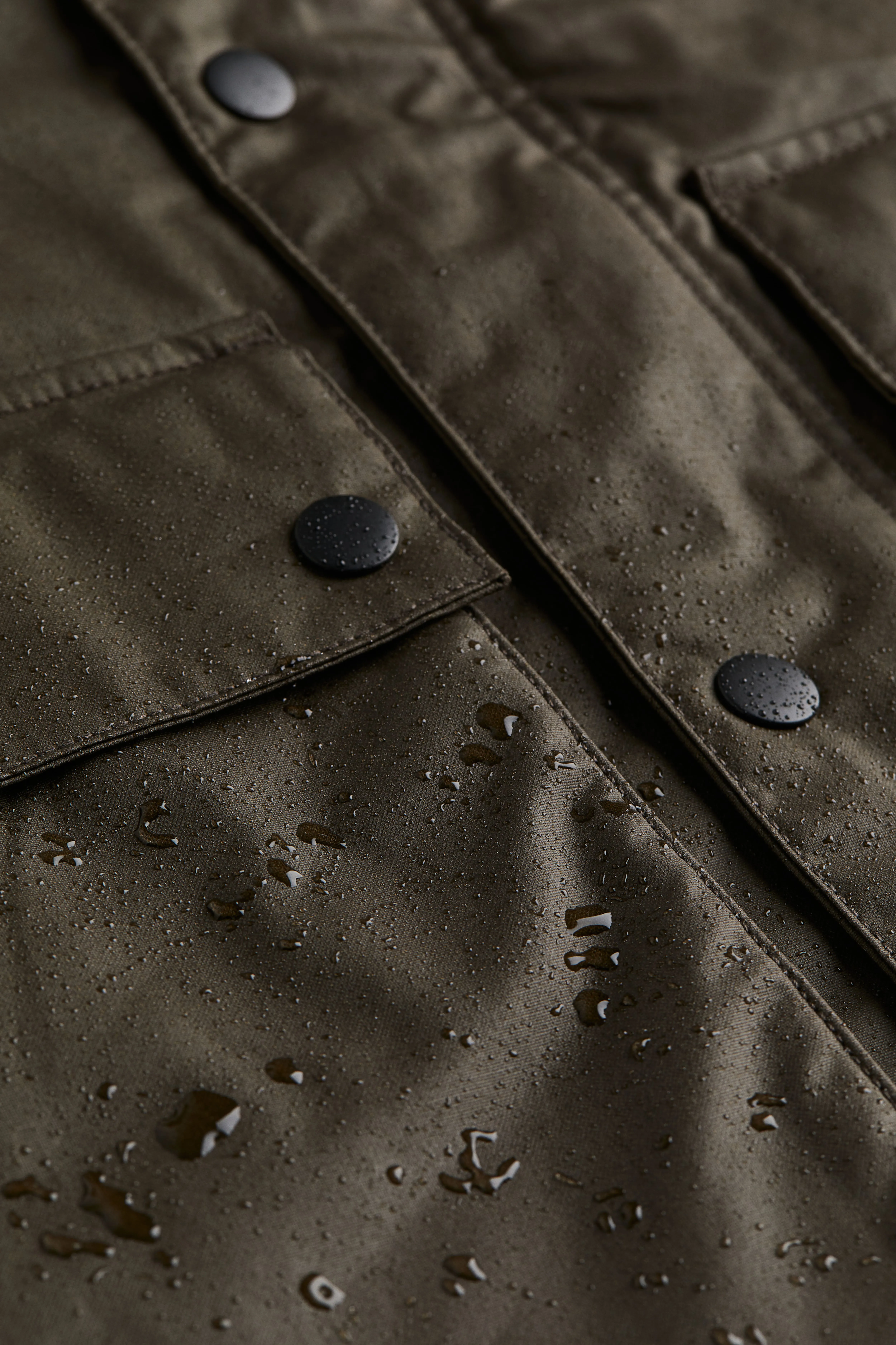 Loose Fit Water-repellent canvas jacket - Long sleeve - Regular length - Dark khaki green - Men | H&M GB