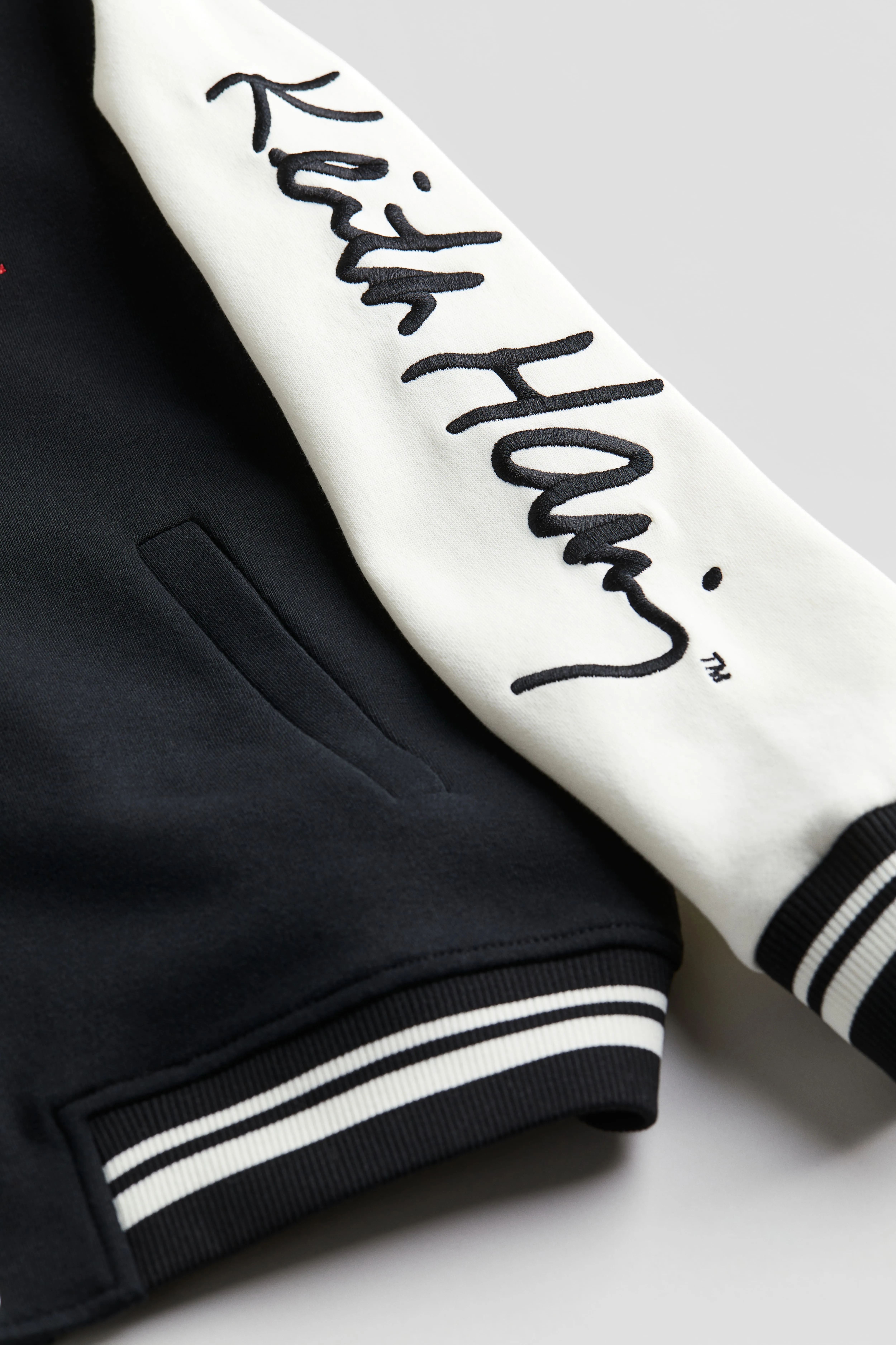 Motif-detail baseball jacket - Long sleeve - Regular length - Black/Keith Haring - Kids | H&M GB